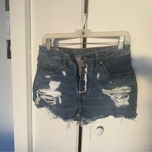 Levi’s premium 501 high waisted dark blue wash jean shorts. Size 27.